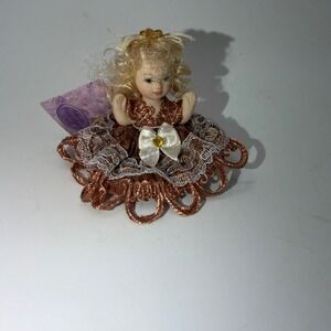 Dolgencorp Miniature Porcelain‎ Doll 3" Christmas ornament
